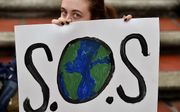 Aan de vooravond van een VN-top over klimaat zijn er in veel landen protesten gehouden. beeld AFP, LUIS ROBAYO
