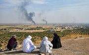 Blik vanaf Turks grondgebied op de bombardementen in Syrië. beeld AFP