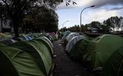 Een migrantenkamp in Parijs. beeld AFP, Christophe Archambault