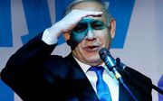 De Israëlische premier Benjamin Netanyahu won donderdag met overmacht de leiderschapsverkiezingen binnen zijn Likudpartij. beeld AFP
