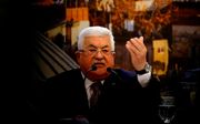 Abbas, dinsdag tijdens een toespraak in Ramallah. beeld AFP, Abbas Momani