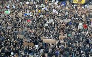 Protest op de Alexanderplatz in Berlijn. beeld AFP