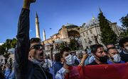 Turken vierden vrijdag het nieuws dat de Hagia Sophia in Istanbul weer een moskee wordt. beeld AFP, Ozan Kose