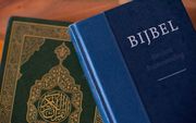 Een bijbel en een koran. beeld ANP