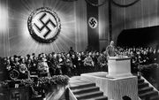 „De bevrijding van nazi-Duitsland was niet minder dan de verlossing van een antichriste-lijke macht. Een macht die taal als een belangrijk wapen hanteerde.” beeld AFP