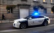 Archieffoto: een auto van de Spaanse nationale politie arriveert bij de rechtbank. beeld AFP, Gabriel Bouys