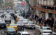Straatbeeld Teheran. beeld AFP