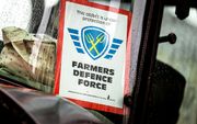 Logo van Farmers Defence Force bij een protest op de Dam. beeld ANP