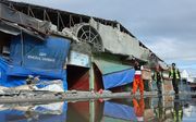 Schade in Padada, Filipijnen, als gevolg van een aardbeving zondag. beeld EPA