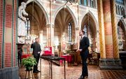 Minister-president Mark Rutte in een kerk in gesprek over het coronavirus. beeld ANP