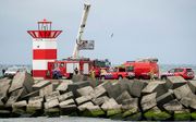 Hulpdiensten bij het Noordelijk Havenhoofd in Scheveningen. beeld ANP