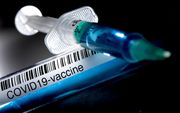 Twintig procent van de SGP-kiezers noemt de gedachte geloofwaardig dat een vaccin tegen het coronavirus een chip injecteert om mensen permanent te blijven volgen. beeld ANP, Koen van Weel