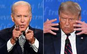 De Amerikaanse president Donald Trump (R) en zijn Democratische uitdager Joe Biden tijdens het eerste verkiezingsdebat. beeld AFP, Jim Watson