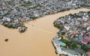Een luchtfoto toont de overstromingen in Hao, Vietnam, beeld AFP