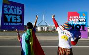Voorstanders van het homohuwelijk vieren feest in Canberra. beeld AFP