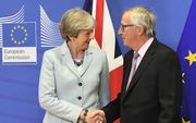 Juncker en May, vrijdagmorgen in Brussel. beeld AFP