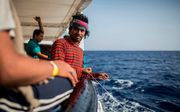 Migranten op zee. beeld AFP