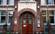 In de Bethelkerk in Den Haag is de asieldienst nog steeds aan de gang. beeld ANP, Koen van Weel