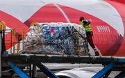 Hulpgoederen arriveren in Willemstad. beeld AFP