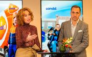 Herna Verhagen, CEO van PostNL en Ronald van de Laar, directeur van Sandd Holding geven in februari een toelichting op de voorgenomen samenvoeging van de postnetwerken van PostNL en Sandd. beeld ANP