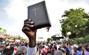 Soedanese christenen demonstreerden zaterdag nabij het militaire hoofdkwartier in Khartoum. beeld AFP