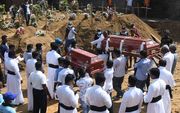 Begrafenis in Negombo. beeld AFP