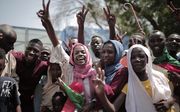 Feestvierende Soedanezen. beeld AFP