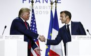 Trump en Macron tijdens hun gezamenlijke persconferentie na afloop van de G7-top in Biarritz. beeld AFP