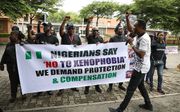 Protesten tegen xenofobie in Nigeria. beeld AFP