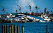 Kapotte boten op het eiland Abaco in de Bahama's. beeld AFP