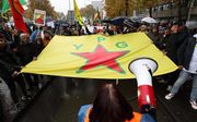 Koerden demonstreren zaterdag in Den Haag tegen de Turkse militaire operatie in Syrie. beeld ANP