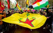 Koerden demonstreren in Den Haag tegen Turkse inval in Noord-Syrie. beeld ANP