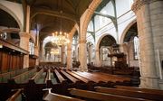 In grote, monumentale kerken levert zingen geen groot risico op, aldus de werkgroep Zingen in de kerk in een woensdag verschenen rapport. Foto: de Sint-Janskerk in Gouda. beeld RD, Anton Dommerholt