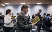 Jehovah's Getuigen tijdens een dienst in Rostov aan de Don. beeld Getty Images
