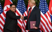 De leiders van Noord-Korea en de VS hebben elkaar al eerder ontmoet. beeld AFP