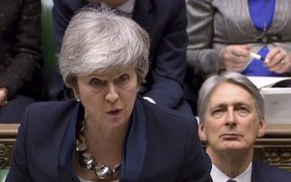 Premier Theresa May dinsdag in het Lagerhuis. beeld AFP