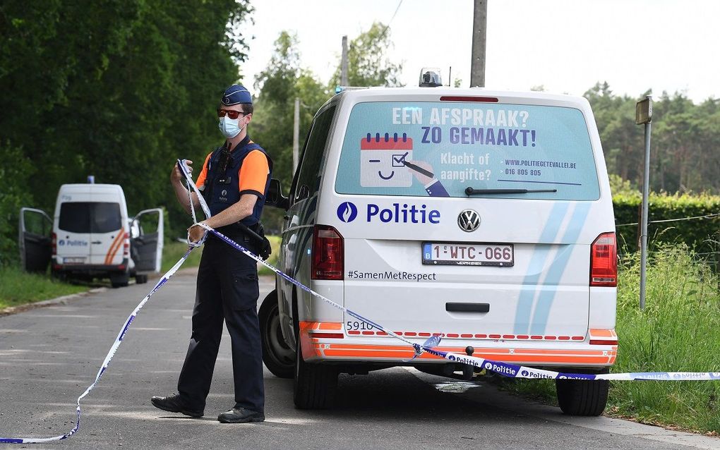 A Belgian policeman cordons off an area where the body of missing rogue soldier Jurgen Conings, was found at the Dilserbos, a forest area of Hoge Kempen National Park near Dilsen-Stokkem, on June 20, 2021. photo AFP, John Thys