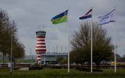 Het terrein van Lelystad Airport. De Kamer heeft dinsdag definitief besloten dat er geen vakantievluchten vanaf de luchthaven mogen vertrekken. beeld ANP, Robin van Lonkhuijsen
