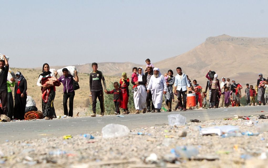 Yezidi’s vluchten voor IS in 2014. beeld AFP, Ahmad al-Rubaye