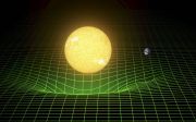 Het ruimte-tijd-continuüm van het heelal vervormt door de massa van sterren, planeten en hun manen. beeld LIGO