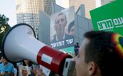 Protest vanuit de lhtb-gemeenschap tegen de Israëlische minister van Onderwijs, Rafi Peretz, dit weekend in Tel Aviv. beeld AFP, Jack Guez