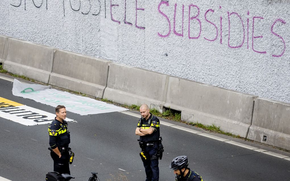 „De toekomst van alles en iedereen staat op het spel. Dus zullen wij in actie blijven komen”, zegt Extinction Rebellion. beeld ANP, Sem van der Wal