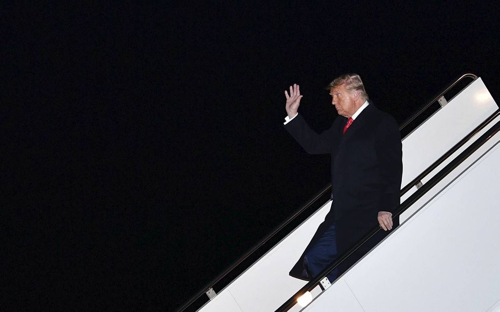 President Trump bij het verlaten van het regeringstoesel, eerder deze week na een bezoek aan een stuk van de grensmuur in Texas.  beeld AFP, Mandel Ngan