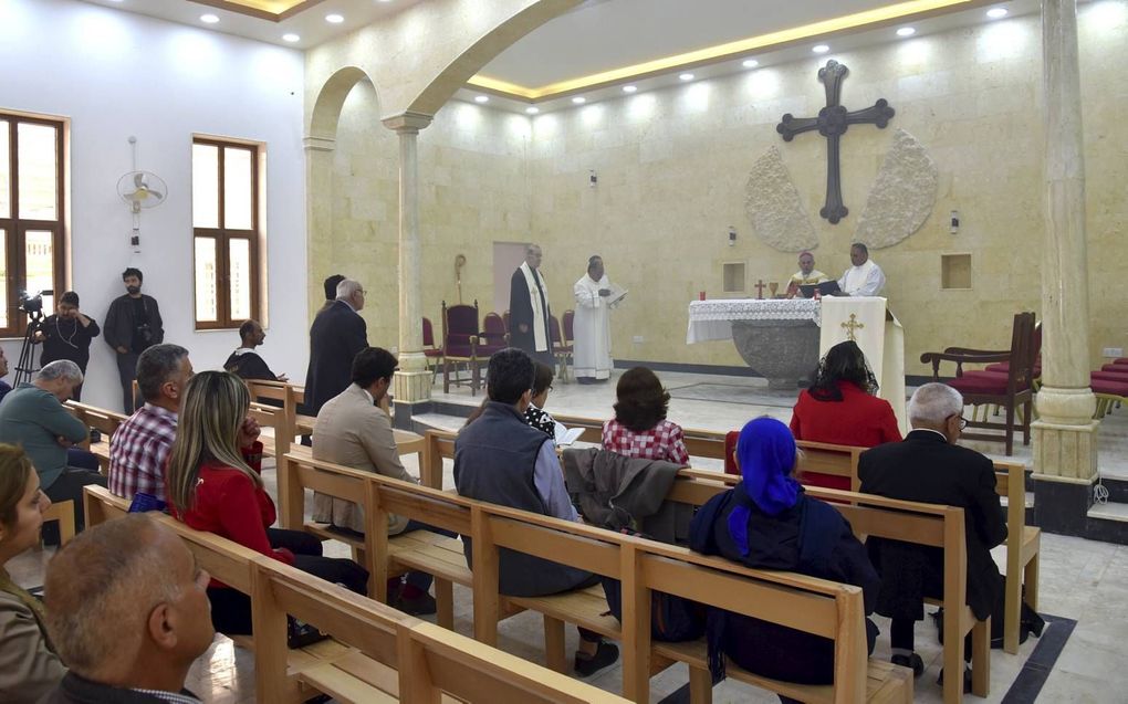 In de omgeving van Mosul (Irak) is een juridisch centrum geopend om christenen voor te lichten over hun rechten. Foto: Christenen vieren eind april het Paasfeest in Mosul. beeld EPA, Ammar Salih