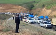Vluchtelingen voor de grens met Armenië. beeld AFP, Siranush Sargsyan