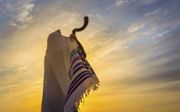 Jom Kippoer, Grote Verzoendag, is de belangrijkste vastendag van het Joodse volk. Aan het einde ervan wordt op de sjofar een langgerekte toon geblazen. beeld iStock