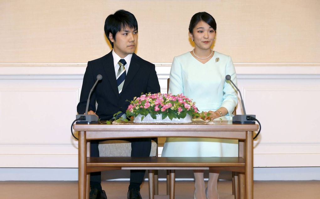 Vier jaar geleden kondigden Mako en Kei hun verloving al aan tijdens een persconferentie. beeld AFP, Shizuo Kambayashi