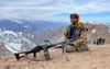 Een talibanstrijder in de bergen van Afghanistan. beeld AFP, Omer Abrar