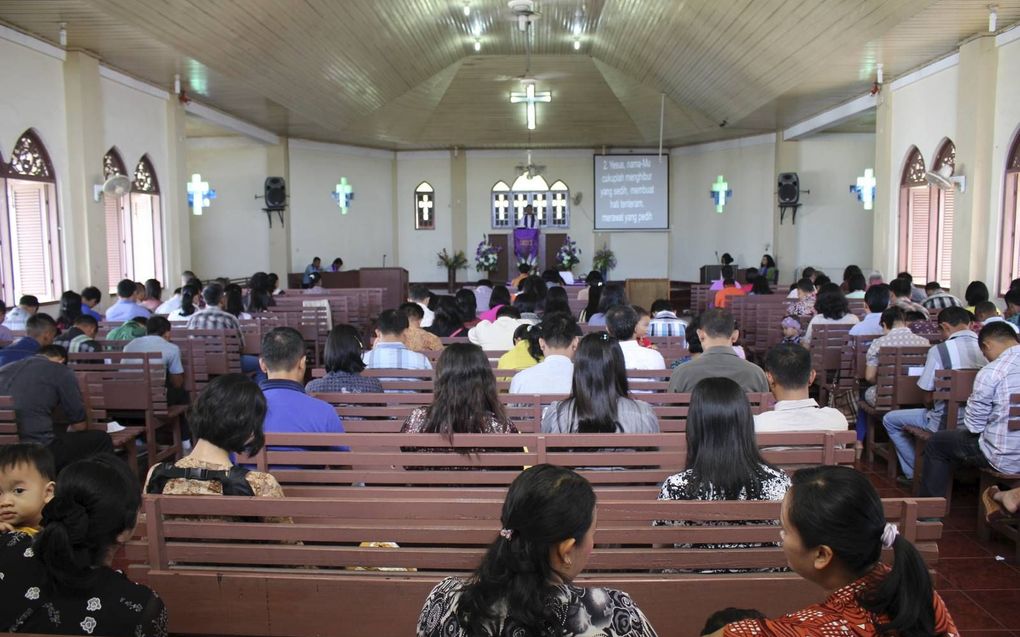 Kerkdienst in Indonesië, hier in Atjeh op Sumatra. beeld Anton Stolwijk