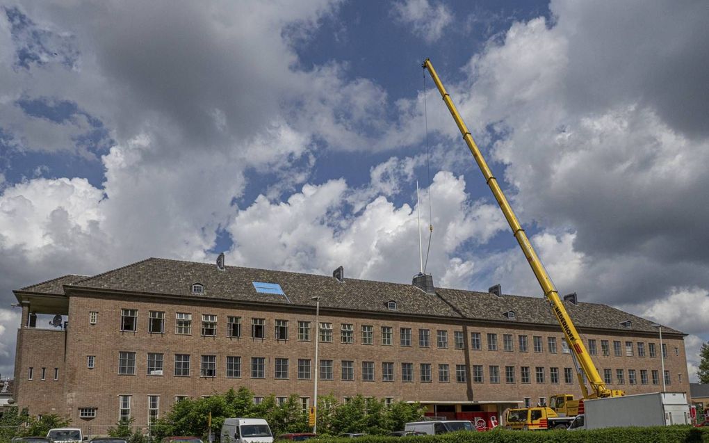 Het poortgebouw van het voormalige Zuiderziekenhuis in Rotterdam, dat een nieuwe bestemming krijgt.  beeld BOEi, Jan van Dalen